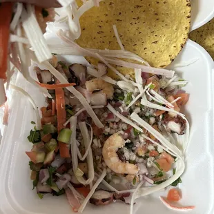 I got say is this is the most nasty dry tostada I had before . I ask for a mix tostada they gave me hand full of crab and 2 sad shrimps