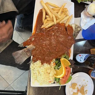 Mojarra agita a la Diabla (fried tilapia in a spicy sauce)