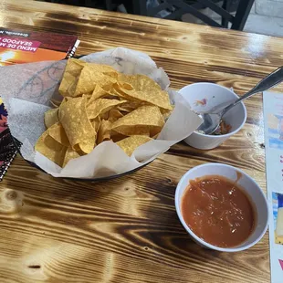 Chips and salsa with a sample of fish ceviche