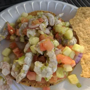 Tostada de camaron.  Tip if you aren't good with spicy stuff mention it so they don't add the green sauce on top.