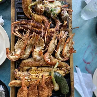  a platter of grilled shrimp