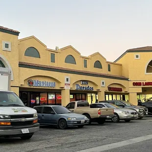 cars parked in front of a store