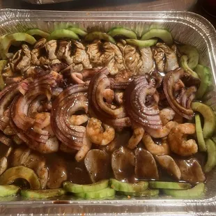 Charola de camarón  cocido y curtido pulpo  y callo