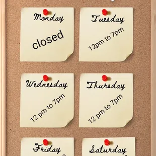 a bulletin board with days of the week written on it