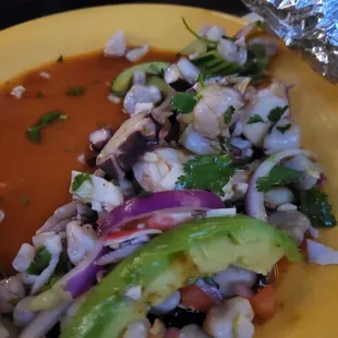 That's half of the tostada mixta! All sea food, all good, cold, fresh taste and good shrimp a la diabla!