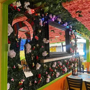a restaurant decorated with flowers