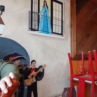 Painting mural on East wall