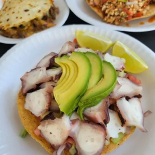 Tostada de puplo milita de asada and a spicy shrimp Mulido