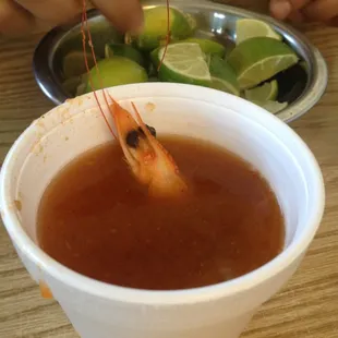 Complementary shrimp soup appetizer.