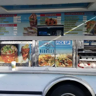 a food truck with menus