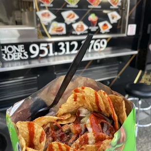 a close up of a taco in a wrapper