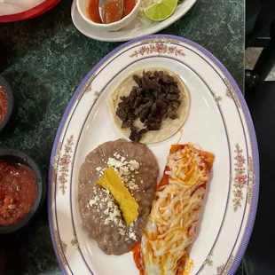 Enchilada and taco with all the trimmings
