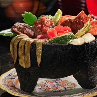 Molcajete de asada I can eat one on my one reminds me of my grandma with a side of home made tortillas