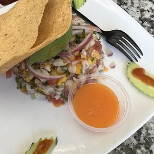 Habanero mango ceviche tostada $12