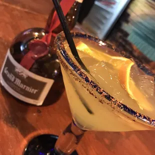 Our Cadillac Margarita at is luxuriously good! Tajin on the rim, grand marnier, gold tequila, and an orange twist makes this a smooth ride!