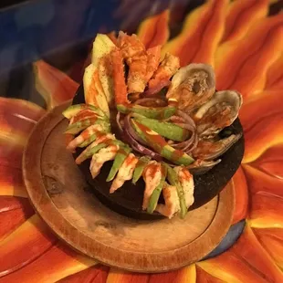 Our Molcajete Frio is a cold seafood platter with so many of your favorites! Oyster. Crab legs. Ceviche. Shrimp. Delicious!