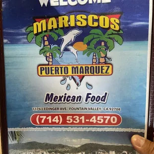 a person holding up a sign