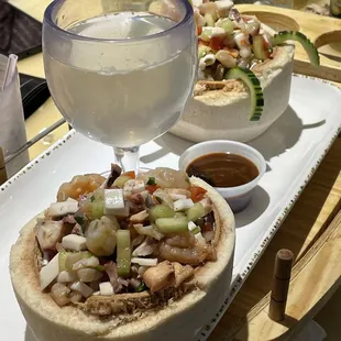 a plate of food and a glass of water