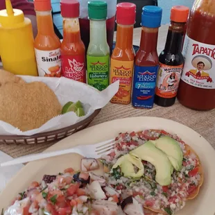 Octopus ceviche and reg ceviche tostadas with 8 hot sauces to choose from All were good