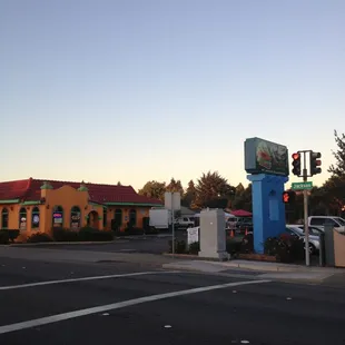 the intersection of a street and a restaurant