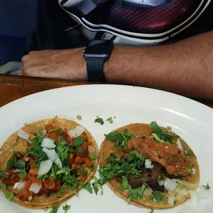 Al pastor and Carne asada tacos with everything