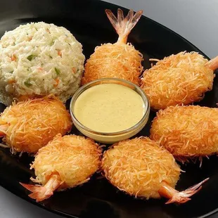 a plate of shrimp and rice