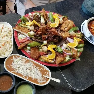 a table full of mexican food