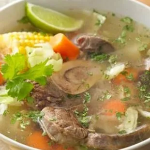 a bowl of beef and vegetable soup