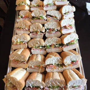 a tray of sandwiches