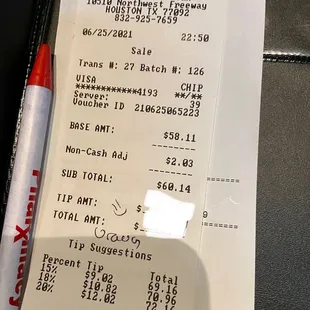 a receipt and a pen