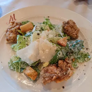 a caesar salad with a couple fried oyster bits, also yummy.