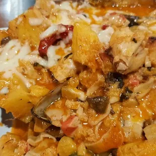 a pineapple covered in cheese