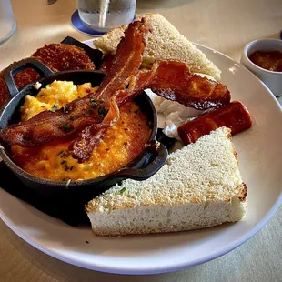 Maritime Fry Up - Fried Green Tomatoes, Pimento Cheese Grits, Toast with homemade Apple Butter with Choice of Poached Eggs.