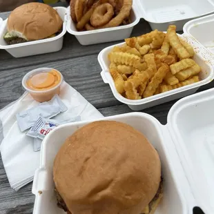 Single burger fries and onion rings