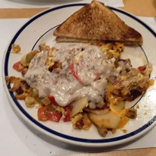 The Scrambler topped with Sausage Gravy.