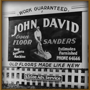 a sign for john david floor sanders