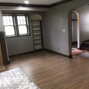 a living room with hardwood floors