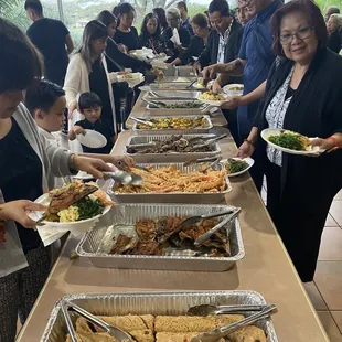 Our guest excited to dive in! Fried Bangus (milk fish) going fast!