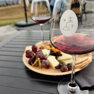 Red wine with half cheese board