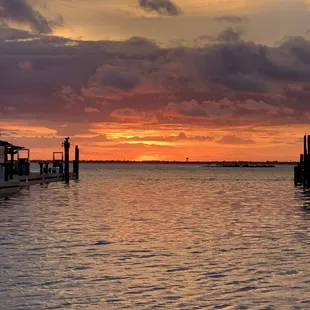 a sunset over the water