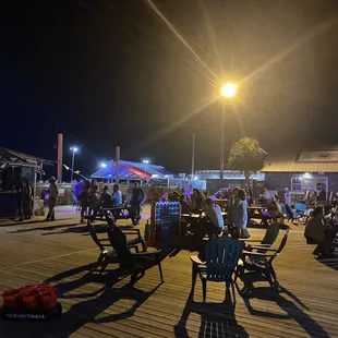 Outdoor seating and games. Two new sand volleyball courts.