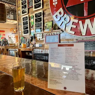 a pint of beer on the bar