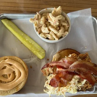 Fried Chicken sandwich with Cole slaw and bacon.