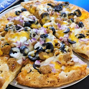 Base of Taco Pizza with toppings in adjacent picture. Build it yourself!