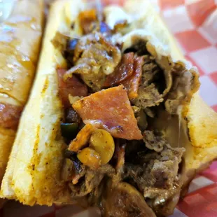 Close up of amazing Cheeseteak with added pepperoni!