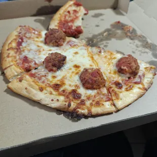 Market27 supposedly regular crust with meatball!