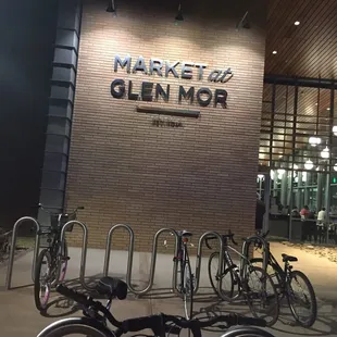 bicycles parked in front of a building