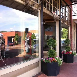 a man riding a horse through the window