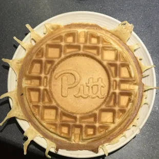 a plate of waffles on a table