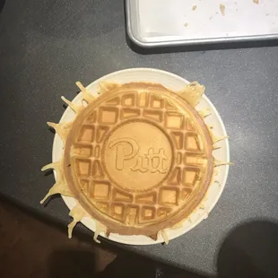 a waffle on a paper plate